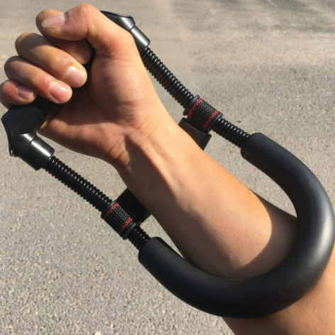 Spring wrist trainer with foam grip