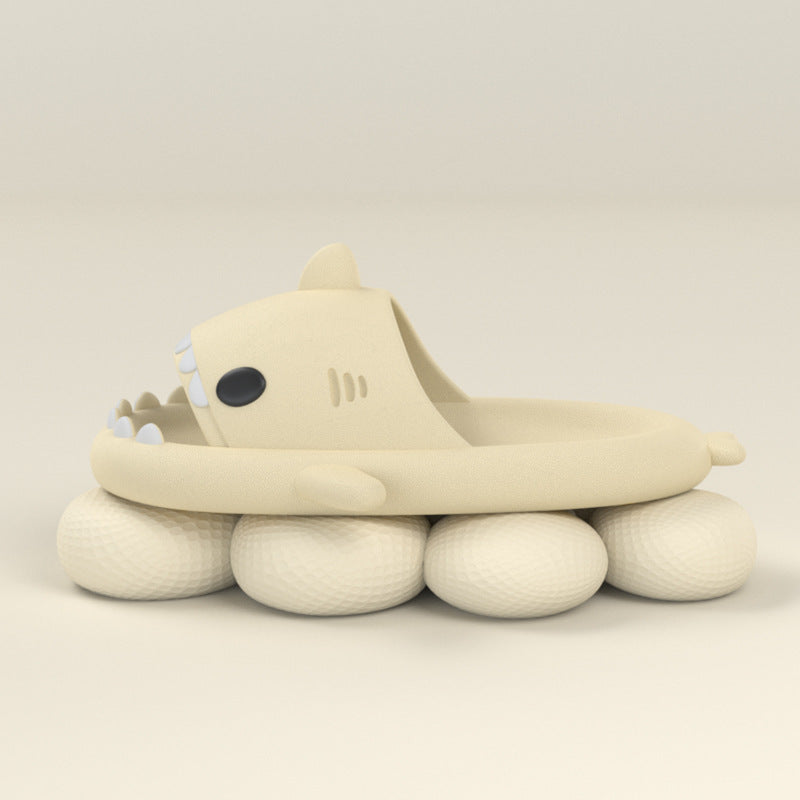 Pink cartoon shark slides on feet